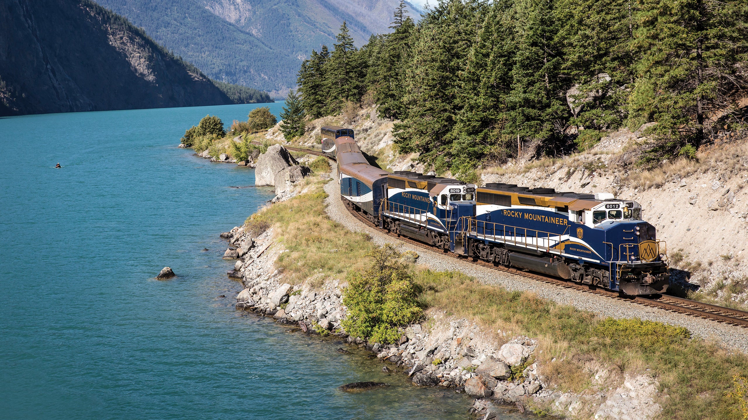 Train traveling through Canadian Rocky Mountains